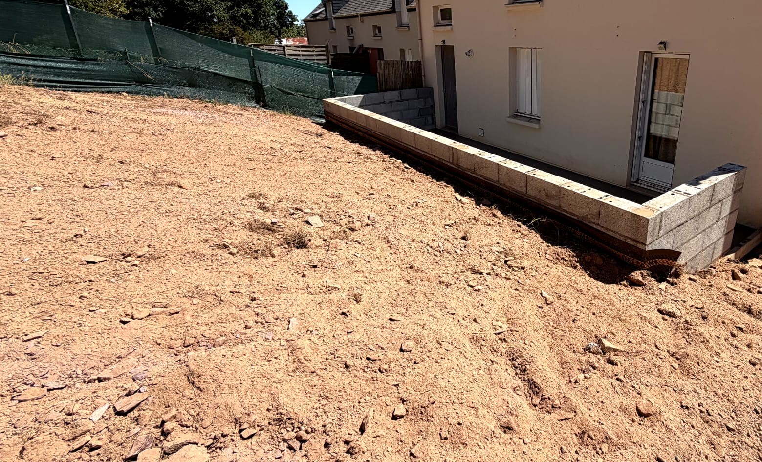 Contrainte du terrain en pente